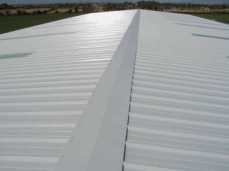 The roof of a metal building, constructed using sheet metal fabrication.